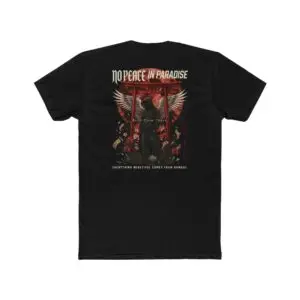 Person wearing a black No Peace In Paradise graphic t-shirt featuring a hooded figure with angel wings beneath a traditional Japanese torii gate, set against a crimson moon with ravens, floral elements, and gothic typography reading "Built From Chaos" and "Everything Beautiful Comes From Damage," photographed in a professional studio.