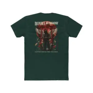 Person wearing a black No Peace In Paradise graphic t-shirt featuring a hooded figure with angel wings beneath a traditional Japanese torii gate, set against a crimson moon with ravens, floral elements, and gothic typography reading "Built From Chaos" and "Everything Beautiful Comes From Damage," photographed in a professional studio.