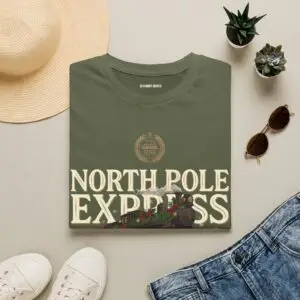 Unisex Gildan 64000 Christmas t-shirt featuring the "North Pole Express" vintage typography with a festive steam train, Christmas foliage, and the "Christmas Service Since 1887" tagline on the front.