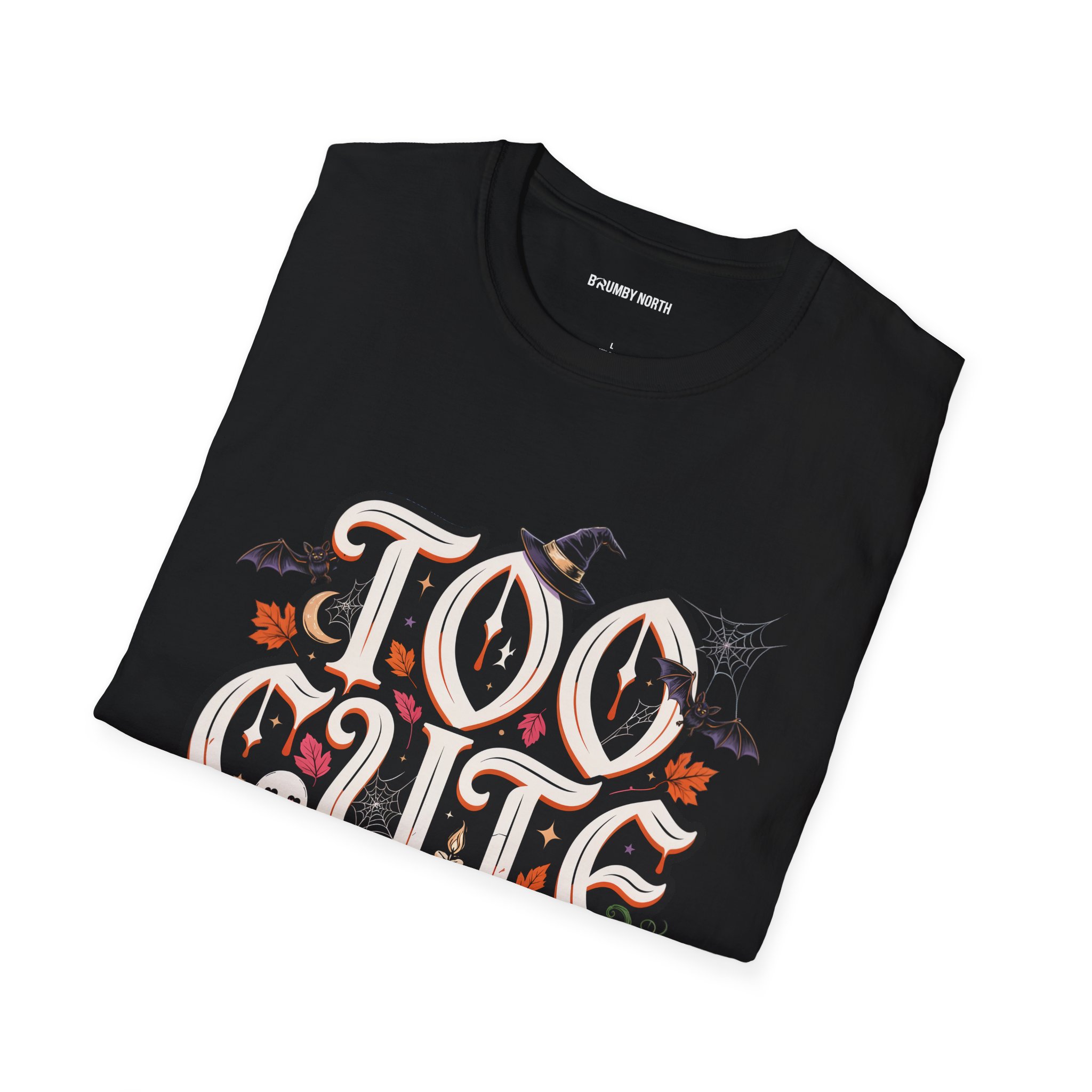 Woman wearing a black Too Cute To Haunt Halloween graphic t-shirt featuring vintage typography, a cute ghost, pumpkin, autumn leaves, and spooky accents in a professional studio.