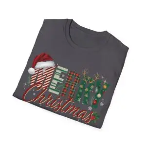 Smiling woman wearing a black Merry Christmas plaid graphic unisex t-shirt featuring festive lettering, Santa hat, reindeer antlers, and holiday decorations in a white studio setting.