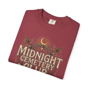 Front View Woman wearing a Comfort Colors Midnight Cemetery Club Halloween graphic t-shirt featuring vintage gothic typography, moonlit cemetery artwork, and a relaxed garment-dyed fit. Lifestyle Alt Text Premium Comfort Colors 1717 garment-dyed Halloween t-shirt with Midnight Cemetery Club vintage cemetery design, photographed on a female model in a casual lifestyle setting.