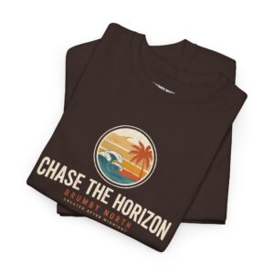 Front Image Woman wearing an olive green Chase The Horizon vintage surf graphic unisex heavy cotton t-shirt featuring a retro sunset chest print in a professional studio. Back Image Back view of woman wearing an olive green Chase The Horizon vintage surf graphic t-shirt with a large retro ocean wave and sunset illustration in a studio setting