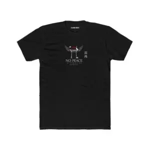 Person wearing a black No Peace In Paradise graphic t-shirt featuring a hooded figure with angel wings beneath a traditional Japanese torii gate, set against a crimson moon with ravens, floral elements, and gothic typography reading "Built From Chaos" and "Everything Beautiful Comes From Damage," photographed in a professional studio.