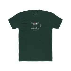 Person wearing a black No Peace In Paradise graphic t-shirt featuring a hooded figure with angel wings beneath a traditional Japanese torii gate, set against a crimson moon with ravens, floral elements, and gothic typography reading "Built From Chaos" and "Everything Beautiful Comes From Damage," photographed in a professional studio.