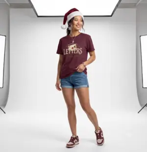Letters from the North Pole vintage Christmas graphic T-shirt Burgundy Christmas mail graphic tee on female model North Pole Post holiday unisex T-shirt front view Vintage Christmas letter graphic premium cotton shirt