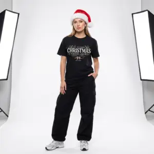 Minimalist Christmas Social Club graphic printed on a unisex Gildan 64000 t-shirt featuring vintage typography, festive holiday foliage, and the "Holiday Edition" tagline.