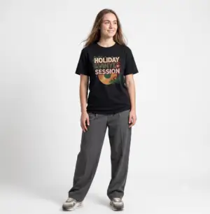 Holiday Vinyl Session retro Christmas record graphic T-shirt on female model Black Holiday Vinyl Session Christmas vinyl graphic tee front view Vintage Christmas music lover unisex T-shirt Retro vinyl record holiday graphic shirt