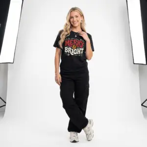 Unisex Gildan 64000 Christmas t-shirt featuring the "Merry & Bright" festive typography design with elegant Christmas leaves in a clean, minimalist holiday style.