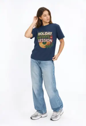 Holiday Vinyl Session retro Christmas record graphic T-shirt on female model Black Holiday Vinyl Session Christmas vinyl graphic tee front view Vintage Christmas music lover unisex T-shirt Retro vinyl record holiday graphic shirt