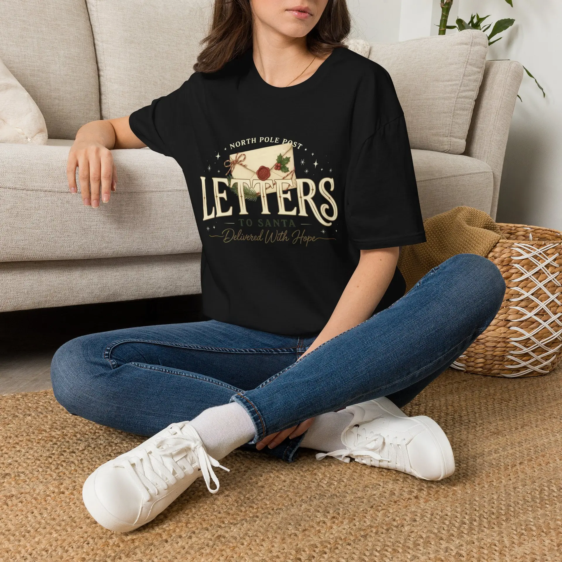 Letters from the North Pole vintage Christmas graphic T-shirt Burgundy Christmas mail graphic tee on female model North Pole Post holiday unisex T-shirt front view Vintage Christmas letter graphic premium cotton shirt