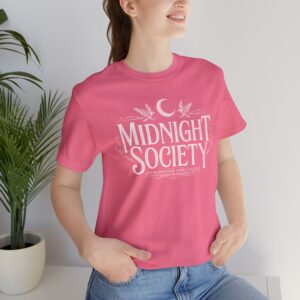 Woman wearing Midnight Society Gothic Halloween graphic t-shirt featuring vintage moon and bat front design. Bella+Canvas Midnight Society Halloween t-shirt with gothic front print on premium unisex cotton tee. Front view of Midnight Society spooky season graphic tee with moon, bats and vintage gothic typography. Premium Halloween graphic t-shirt with minimalist Midnight Society front artwork for autumn fashion