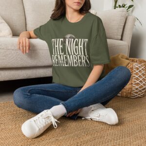 Front Mockup 1 The Night Remembers gothic moon graphic t-shirt featuring vintage typography, full moon, bats and haunted tree artwork. Front Mockup 2 Women's gothic Halloween graphic tee with The Night Remembers vintage moon design. Front Mockup 3 Vintage Halloween t-shirt with bold gothic typography and spooky moon artwork. Front Mockup 4 Dark aesthetic graphic t-shirt featuring The Night Remembers moon and haunted forest illustration. Back Mockup 1 Back view of The Night Remembers gothic Halloween t-shirt showing premium unisex fit. Back Mockup 2 Rear view of premium Gildan 64000 Halloween graphic tee from Brumbynorth. Close-up 1 Close-up of premium DTG printed gothic moon artwork on soft ring-spun cotton fabric. Close-up 2 Detailed close-up of The Night Remembers Halloween graphic showing crisp vintage typography and moon illustration.