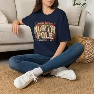 Image Alt Text Front Images North Pole Winter Edition athletic club graphic T-shirt on female model Forest green North Pole Winter Edition Christmas graphic tee front view Vintage holiday athletic club unisex T-shirt North Pole varsity Christmas graphic shirt Lifestyle Images Woman wearing North Pole Winter Edition holiday T-shirt in studio Casual festive outfit featuring North Pole Winter Edition graphic tee Close-up Images North Pole Winter Edition varsity Christmas graphic close-up Premium DTG printed holiday athletic club design on forest green T-shirt