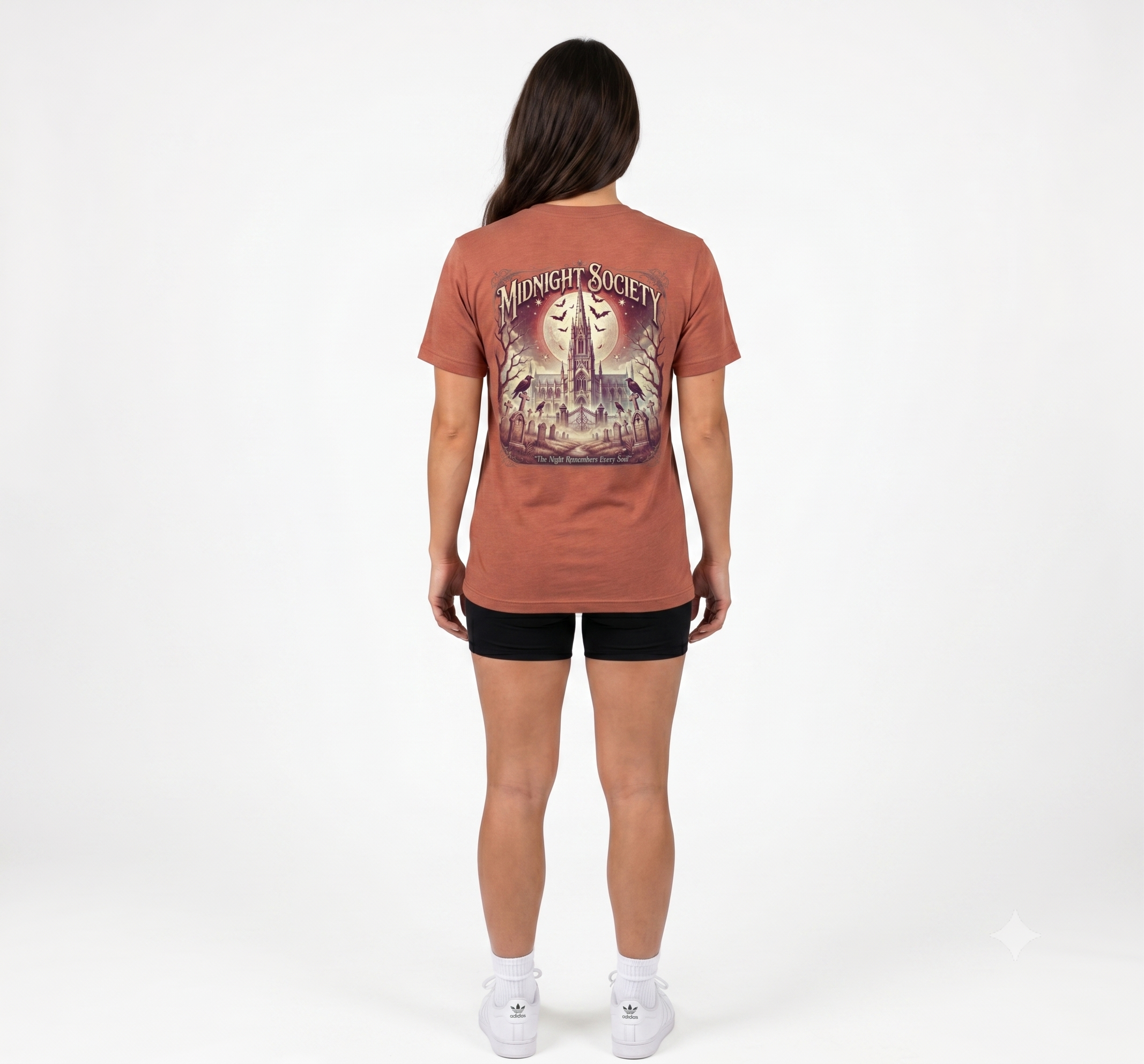 Woman wearing Midnight Society Gothic Halloween graphic t-shirt featuring vintage moon and bat front design. Bella+Canvas Midnight Society Halloween t-shirt with gothic front print on premium unisex cotton tee. Front view of Midnight Society spooky season graphic tee with moon, bats and vintage gothic typography. Premium Halloween graphic t-shirt with minimalist Midnight Society front artwork for autumn fashion