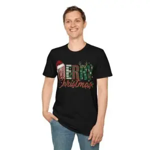 Smiling woman wearing a black Merry Christmas plaid graphic unisex t-shirt featuring festive lettering, Santa hat, reindeer antlers, and holiday decorations in a white studio setting.