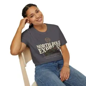 Unisex Gildan 64000 Christmas t-shirt featuring the "North Pole Express" vintage typography with a festive steam train, Christmas foliage, and the "Christmas Service Since 1887" tagline on the front.