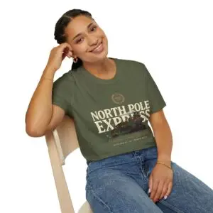 Unisex Gildan 64000 Christmas t-shirt featuring the "North Pole Express" vintage typography with a festive steam train, Christmas foliage, and the "Christmas Service Since 1887" tagline on the front.