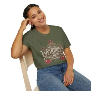 Evergreen Conservatory vintage botanical Christmas graphic T-shirt on female model Navy Evergreen Conservatory holiday greenhouse graphic tee front view Vintage botanical Christmas unisex T-shirt Evergreen Conservatory festive greenhouse graphic shirt