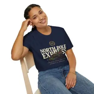 Unisex Gildan 64000 Christmas t-shirt featuring the "North Pole Express" vintage typography with a festive steam train, Christmas foliage, and the "Christmas Service Since 1887" tagline on the front.
