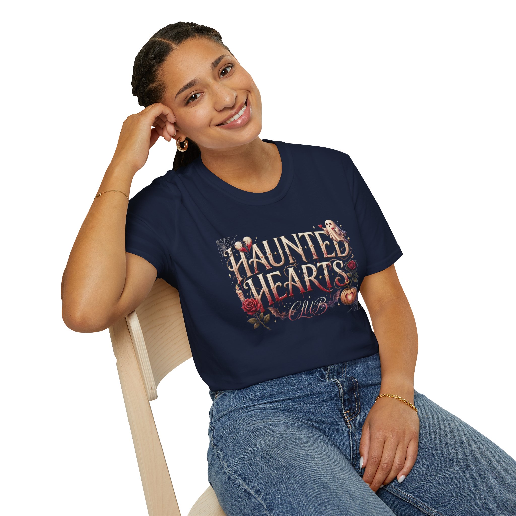 Woman wearing a black Haunted Hearts Club gothic Halloween graphic t-shirt featuring vintage pumpkins, ghosts, and floral artwork.