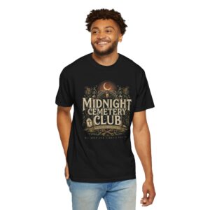Front View Woman wearing a Comfort Colors Midnight Cemetery Club Halloween graphic t-shirt featuring vintage gothic typography, moonlit cemetery artwork, and a relaxed garment-dyed fit. Lifestyle Alt Text Premium Comfort Colors 1717 garment-dyed Halloween t-shirt with Midnight Cemetery Club vintage cemetery design, photographed on a female model in a casual lifestyle setting.