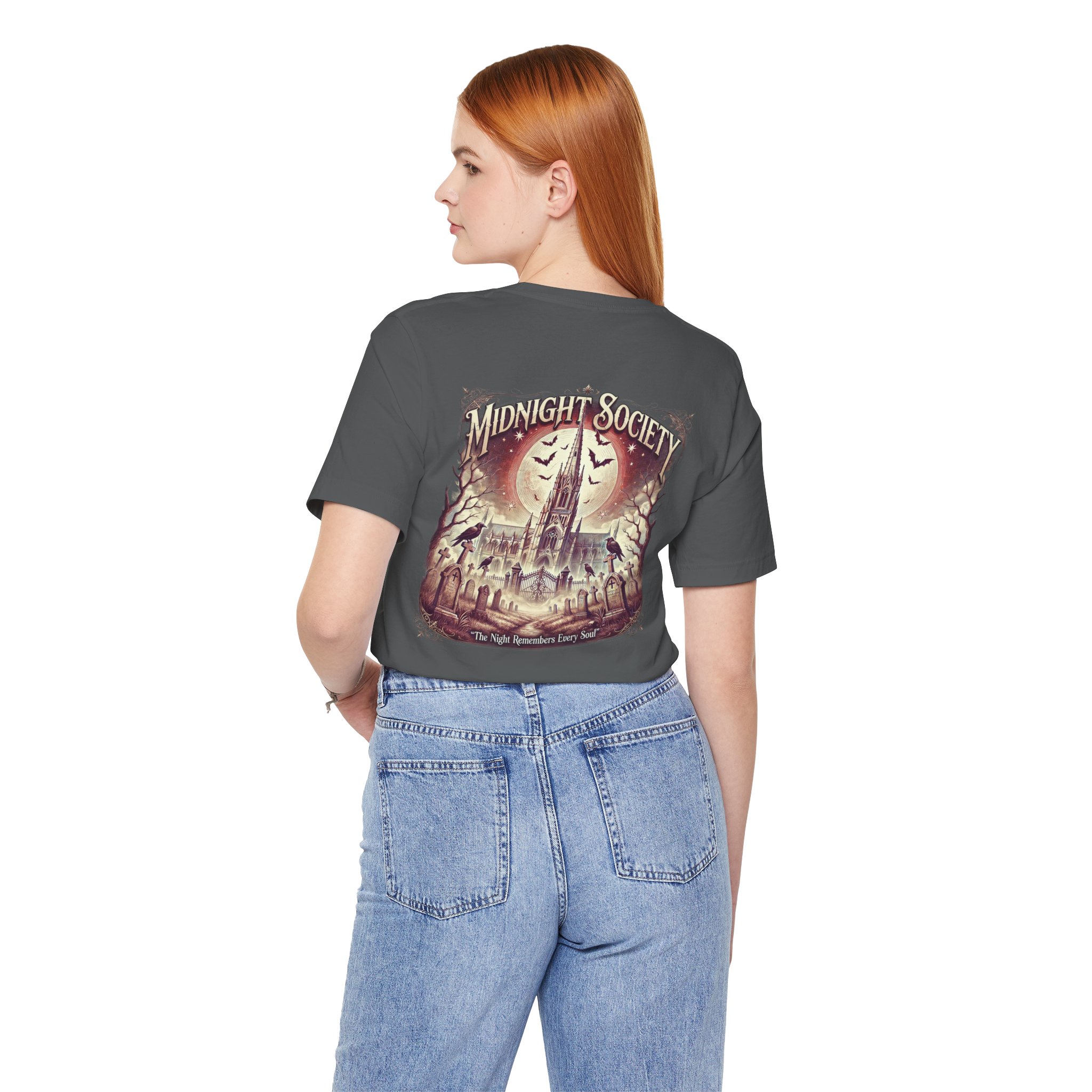 Woman wearing Midnight Society Gothic Halloween graphic t-shirt featuring vintage moon and bat front design. Bella+Canvas Midnight Society Halloween t-shirt with gothic front print on premium unisex cotton tee. Front view of Midnight Society spooky season graphic tee with moon, bats and vintage gothic typography. Premium Halloween graphic t-shirt with minimalist Midnight Society front artwork for autumn fashion