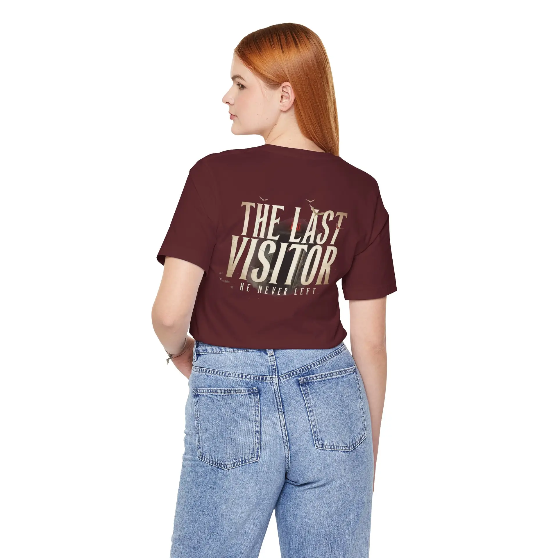 Image Alt Text (Front) Black Bella+Canvas 3001 unisex t-shirt featuring a vintage gothic "Visitor" front graphic with minimalist horror typography, modeled in a studio setting. Image Alt Text (Back) Back view of a black Bella+Canvas 3001 unisex t-shirt featuring "The Last Visitor" gothic horror back graphic with vintage typography and subtle distressed details, modeled in a studio setting.