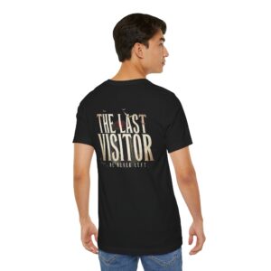 Image Alt Text (Front) Black Bella+Canvas 3001 unisex t-shirt featuring a vintage gothic "Visitor" front graphic with minimalist horror typography, modeled in a studio setting. Image Alt Text (Back) Back view of a black Bella+Canvas 3001 unisex t-shirt featuring "The Last Visitor" gothic horror back graphic with vintage typography and subtle distressed details, modeled in a studio setting.