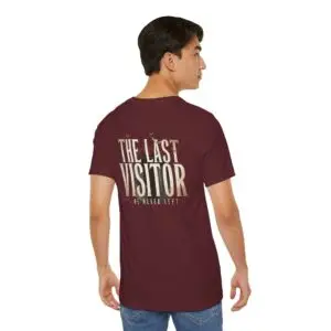 Image Alt Text (Front) Black Bella+Canvas 3001 unisex t-shirt featuring a vintage gothic "Visitor" front graphic with minimalist horror typography, modeled in a studio setting. Image Alt Text (Back) Back view of a black Bella+Canvas 3001 unisex t-shirt featuring "The Last Visitor" gothic horror back graphic with vintage typography and subtle distressed details, modeled in a studio setting.