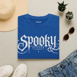 Model wearing a black Spooky Season gothic Halloween graphic unisex T-shirt Short Product Text Lean into Halloween season with a vintage gothic “spooky season” graphic tee. A lightweight unisex T-shirt made for autumn streetwear, horror nights and everyday casual looks.