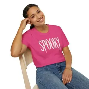 Model wearing a black unisex SPOOKY Halloween graphic T-shirt Short Product Text A bold “SPOOKY” graphic tee with a vintage gothic horror feel. Lightweight, unisex and easy to style for Halloween season or everyday streetwear.