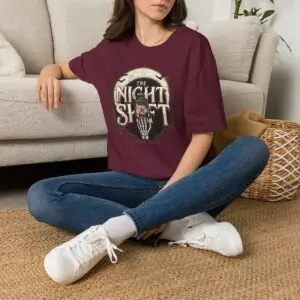 Model wearing The Night Shift vintage lantern moon graphic unisex T-shirt Short Product Text Made for the hours after dark. The Night Shift T-Shirt pairs a vintage lantern moon graphic with a slightly distressed finish for an understated nighttime streetwear look. SEO Keywords / Tags the night shift t-shirt, night shift graphic tee, vintage lantern t-shirt, moon graphic tee, after dark t-shirt, night owl shirt, vintage streetwear, distressed graphic tee, nighttime t-shirt, unisex graphic tee, retro graphic t-shirt