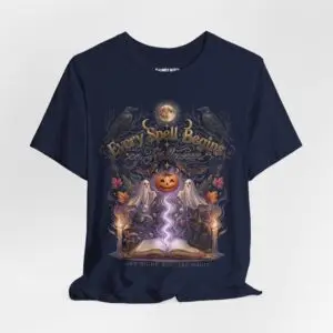 Woman wearing a black Bella+Canvas Halloween graphic t-shirt featuring a vintage illustration of an enchanted spell book, pumpkin, ghosts, candles, ravens, and the phrase "Every Spell Begins on Halloween."