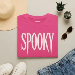 Model wearing a black unisex SPOOKY Halloween graphic T-shirt Short Product Text A bold “SPOOKY” graphic tee with a vintage gothic horror feel. Lightweight, unisex and easy to style for Halloween season or everyday streetwear.