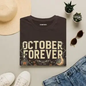 October Forever vintage Halloween graphic t-shirt featuring distressed typography, glowing crescent moon, lantern, autumn leaves, vines, and gothic fall-inspired artwork on a premium Gildan Softstyle unisex tee.