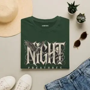 A dark gothic graphic tee featuring a raven and vintage-inspired lettering. Lightweight, unisex and made for Halloween season, late-night looks and everyday streetwear.