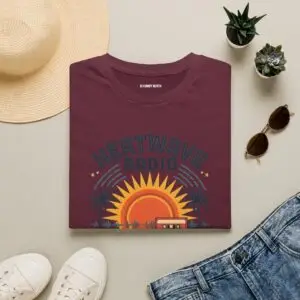 A vintage summer broadcast in T-shirt form. Heatwave Radio combines sunset colors, palm trees and retro radio graphics for an easygoing streetwear look.