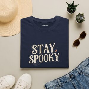 A black Stay Spooky Halloween t-shirt featuring a retro script chest graphic with subtle Halloween accents.