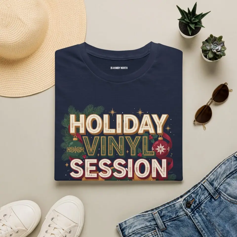 Front Images Holiday Vinyl Session retro Christmas record graphic T-shirt on female model Black Holiday Vinyl Session Christmas vinyl graphic tee front view Vintage Christmas music lover unisex T-shirt Retro vinyl record holiday graphic shirt Lifestyle Images Woman wearing Holiday Vinyl Session Christmas T-shirt in studio Casual festive outfit featuring Holiday Vinyl Session graphic tee Close-up Images Holiday Vinyl Session Christmas vinyl record graphic close-up Premium DTG printed retro holiday music design on black T-shirt