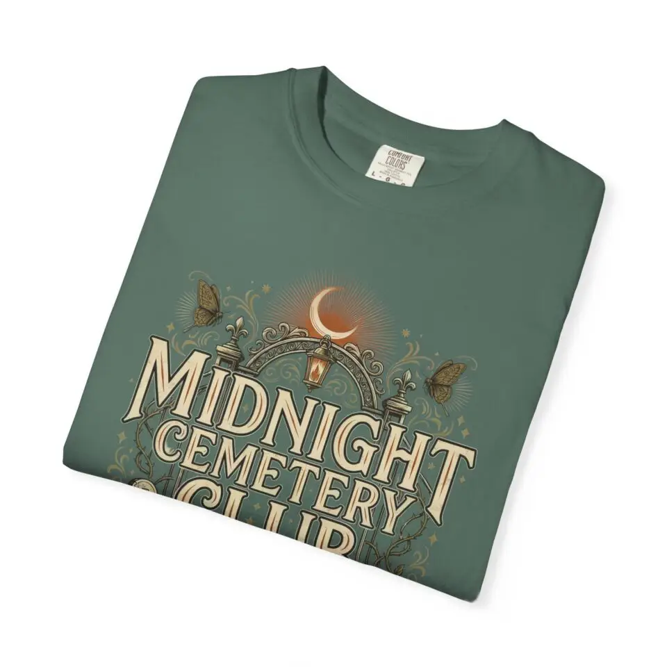 Front View Woman wearing a Comfort Colors Midnight Cemetery Club Halloween graphic t-shirt featuring vintage gothic typography, moonlit cemetery artwork, and a relaxed garment-dyed fit. Lifestyle Alt Text Premium Comfort Colors 1717 garment-dyed Halloween t-shirt with Midnight Cemetery Club vintage cemetery design, photographed on a female model in a casual lifestyle setting.