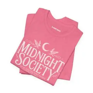 Midnight Society Gothic Halloween graphic t-shirt featuring vintage moon and bat front design. Bella+Canvas Midnight Society Halloween t-shirt with gothic front print on premium unisex cotton tee. Front view of Midnight Society spooky season graphic tee with moon, bats and vintage gothic typography. Premium Halloween graphic t-shirt with minimalist Midnight Society front artwork for autumn fashion. Back Images (2) Back view of Midnight Society Halloween t-shirt featuring large moonlit cemetery, gothic church and vintage horror artwork. Oversized gothic Halloween back graphic with cathedral, moon, ravens and vintage cemetery illustration on Bella+Canvas tee. Close-Up Images (2) Close-up of premium DTF printed Midnight Society graphic showing detailed gothic artwork and sharp vintage typography. Detailed close-up of moonlit cemetery Halloween print with distressed gothic illustration on soft Bella+Canvas cotton t-shirt