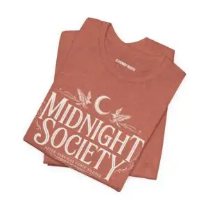 Midnight Society Gothic Halloween graphic t-shirt featuring vintage moon and bat front design. Bella+Canvas Midnight Society Halloween t-shirt with gothic front print on premium unisex cotton tee. Front view of Midnight Society spooky season graphic tee with moon, bats and vintage gothic typography. Premium Halloween graphic t-shirt with minimalist Midnight Society front artwork for autumn fashion. Back Images (2) Back view of Midnight Society Halloween t-shirt featuring large moonlit cemetery, gothic church and vintage horror artwork. Oversized gothic Halloween back graphic with cathedral, moon, ravens and vintage cemetery illustration on Bella+Canvas tee. Close-Up Images (2) Close-up of premium DTF printed Midnight Society graphic showing detailed gothic artwork and sharp vintage typography. Detailed close-up of moonlit cemetery Halloween print with distressed gothic illustration on soft Bella+Canvas cotton t-shirt