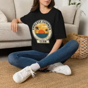 Image Alt Text Main Image Female model wearing an Endless Summer Club vintage California graphic t-shirt with a sunset, palm trees, and ocean design. Product-Focused Alt Text Endless Summer Club unisex t-shirt featuring a retro California coast sunset and palm tree graphic on a white tee. SEO-Friendly Alt Text Vintage California summer graphic t-shirt with Endless Summer Club typography, sunset, palm trees, and ocean artwork.