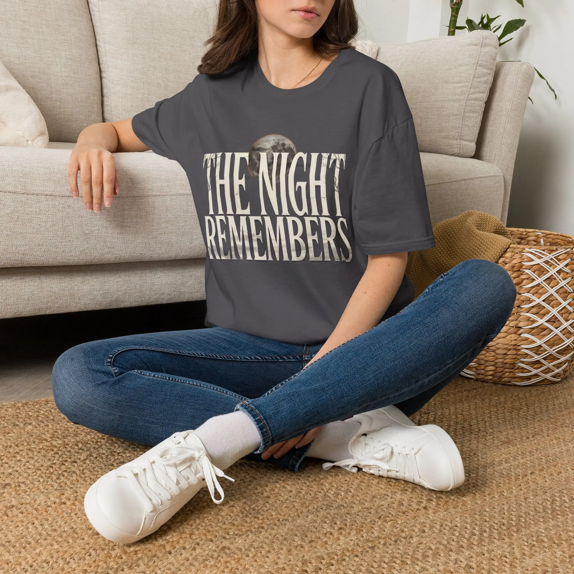 Front Mockup 1 The Night Remembers gothic moon graphic t-shirt featuring vintage typography, full moon, bats and haunted tree artwork. Front Mockup 2 Women's gothic Halloween graphic tee with The Night Remembers vintage moon design. Front Mockup 3 Vintage Halloween t-shirt with bold gothic typography and spooky moon artwork. Front Mockup 4 Dark aesthetic graphic t-shirt featuring The Night Remembers moon and haunted forest illustration. Back Mockup 1 Back view of The Night Remembers gothic Halloween t-shirt showing premium unisex fit. Back Mockup 2 Rear view of premium Gildan 64000 Halloween graphic tee from Brumbynorth. Close-up 1 Close-up of premium DTG printed gothic moon artwork on soft ring-spun cotton fabric. Close-up 2 Detailed close-up of The Night Remembers Halloween graphic showing crisp vintage typography and moon illustration.