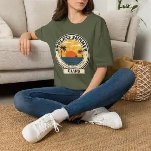Image Alt Text Main Image Female model wearing an Endless Summer Club vintage California graphic t-shirt with a sunset, palm trees, and ocean design. Product-Focused Alt Text Endless Summer Club unisex t-shirt featuring a retro California coast sunset and palm tree graphic on a white tee. SEO-Friendly Alt Text Vintage California summer graphic t-shirt with Endless Summer Club typography, sunset, palm trees, and ocean artwork.