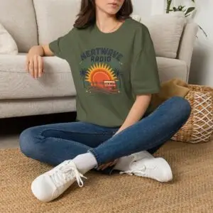 A vintage summer broadcast in T-shirt form. Heatwave Radio combines sunset colors, palm trees and retro radio graphics for an easygoing streetwear look.