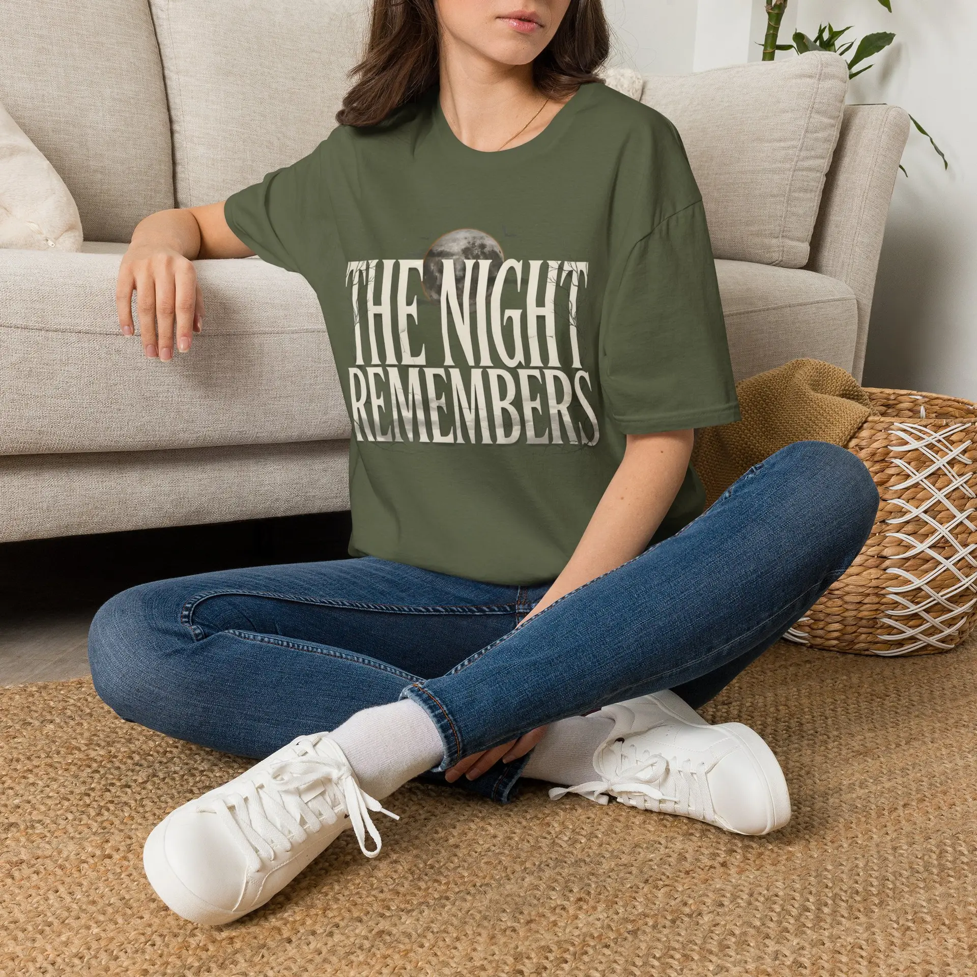 Front Mockup 1 The Night Remembers gothic moon graphic t-shirt featuring vintage typography, full moon, bats and haunted tree artwork. Front Mockup 2 Women's gothic Halloween graphic tee with The Night Remembers vintage moon design. Front Mockup 3 Vintage Halloween t-shirt with bold gothic typography and spooky moon artwork. Front Mockup 4 Dark aesthetic graphic t-shirt featuring The Night Remembers moon and haunted forest illustration. Back Mockup 1 Back view of The Night Remembers gothic Halloween t-shirt showing premium unisex fit. Back Mockup 2 Rear view of premium Gildan 64000 Halloween graphic tee from Brumbynorth. Close-up 1 Close-up of premium DTG printed gothic moon artwork on soft ring-spun cotton fabric. Close-up 2 Detailed close-up of The Night Remembers Halloween graphic showing crisp vintage typography and moon illustration.