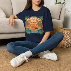 A vintage vacation club graphic with an after-dark attitude. Island After Dark blends tropical palms, sunset colors and ocean waves into an easygoing retro streetwear tee.