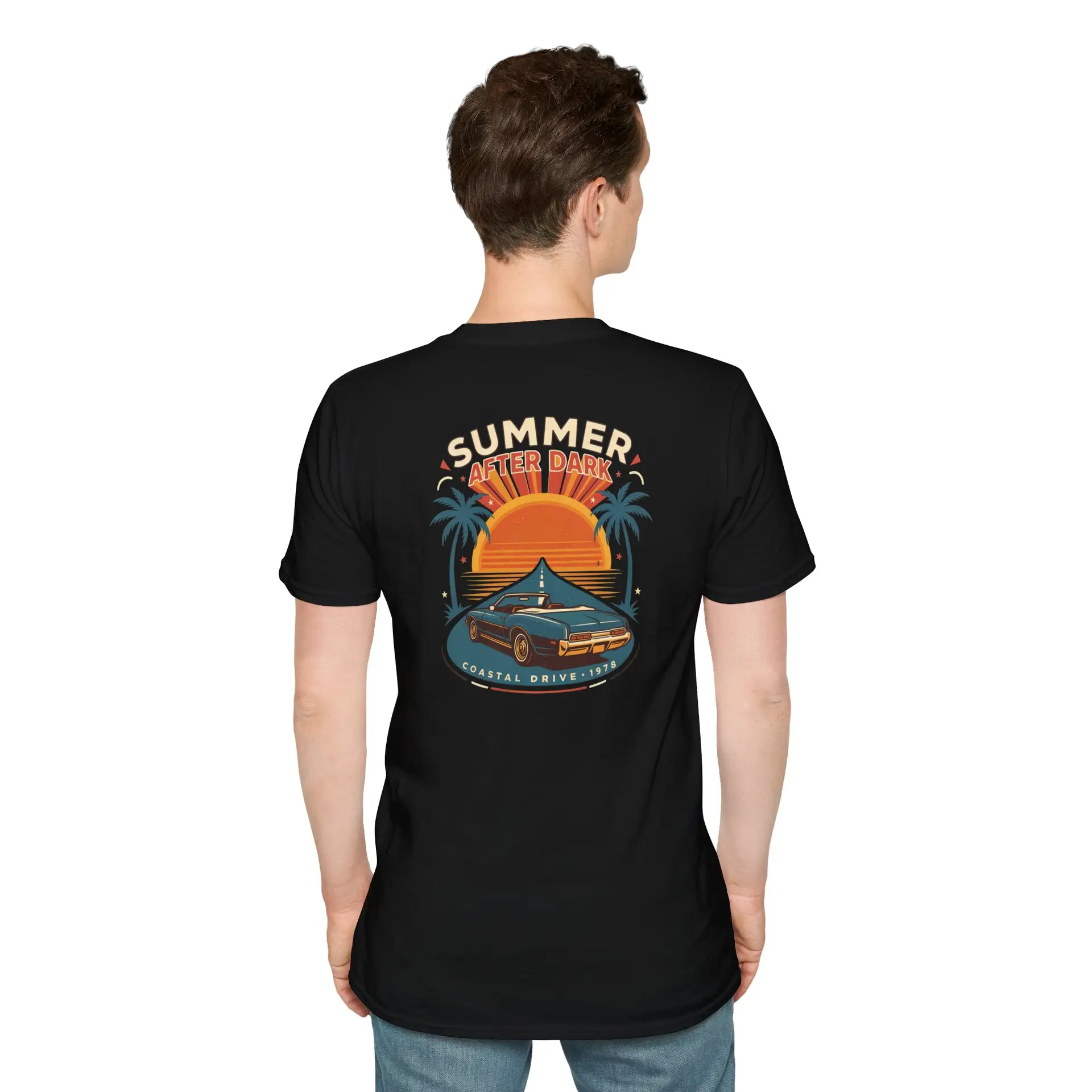 A retro summer road-trip graphic featuring a sunset, palm trees and classic car details, finished with Summer After Dark and Coastal Drive — 1979 lettering. A bold vintage-inspired addition to everyday streetwear.